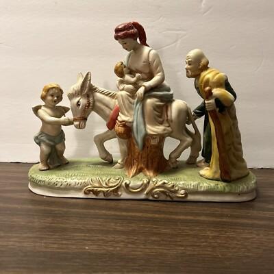 Figurine Joseph, Mary, Baby Jesus on Donkey, & Angel