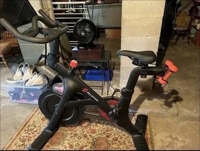 Gently/Rarely Used Peloton Bike (+ W7.5 Clip In Shoes, Mat, Handweights 2)