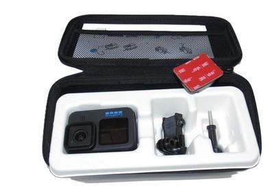 GoPro Hero 11 Black Action Camera with 128GB, a battery and a CASE Hero11