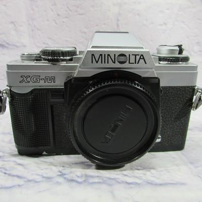Vintage Minolta XG-M 35mm Film SLR Camera Body Silver Japan W/ Cap Strap Manual